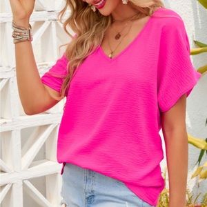 Hot pink top, new in package